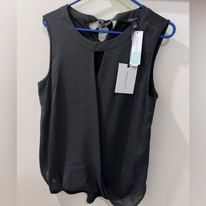 EUC black blouse.  Super cute slit in front with ribbon in back.